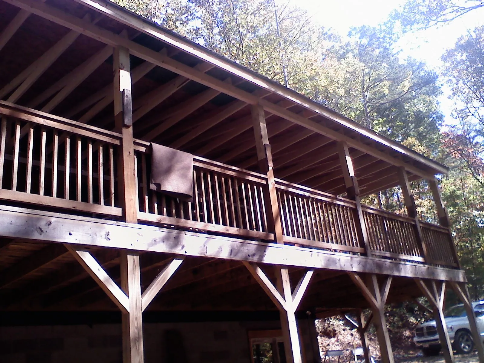 Timber framing under a new elevated porch and deck — Roof Leak Repair in North Wilkesboro by Roofing Brothers
